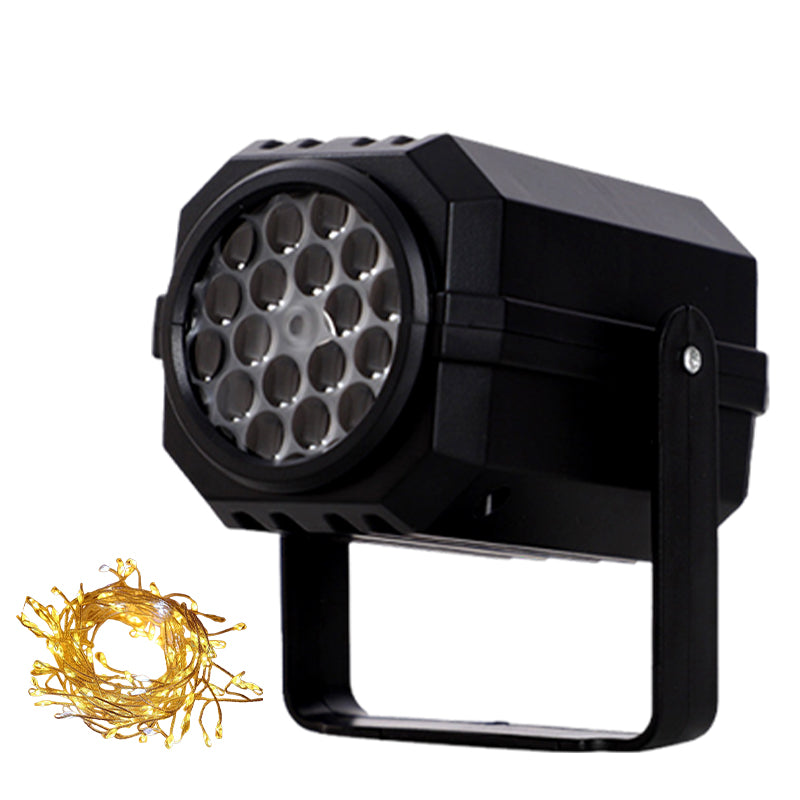 Rotating projector with LED lights creates a Christmas effect.